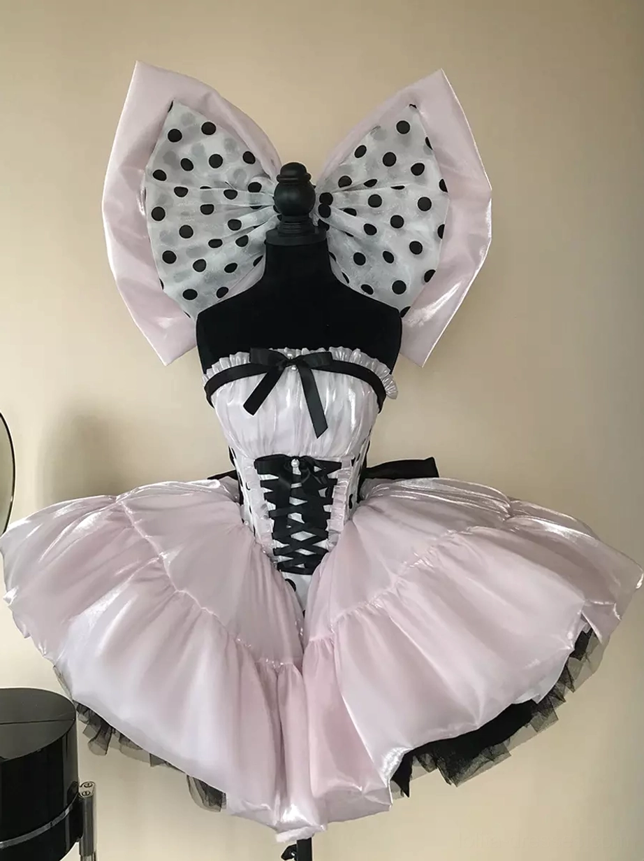 Pink polka dot ballet lolita dress silhouette showing graceful movement and elegant proportions sweet rococo aesthetic