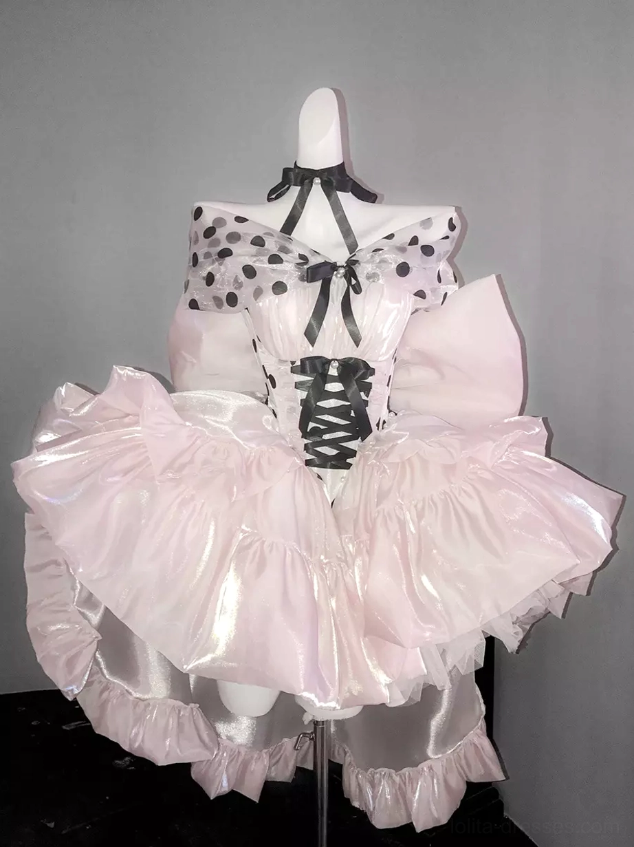 Pink polka dot ballet lolita dress three-quarter front view with halter neckline side pink bow and corset lace detail