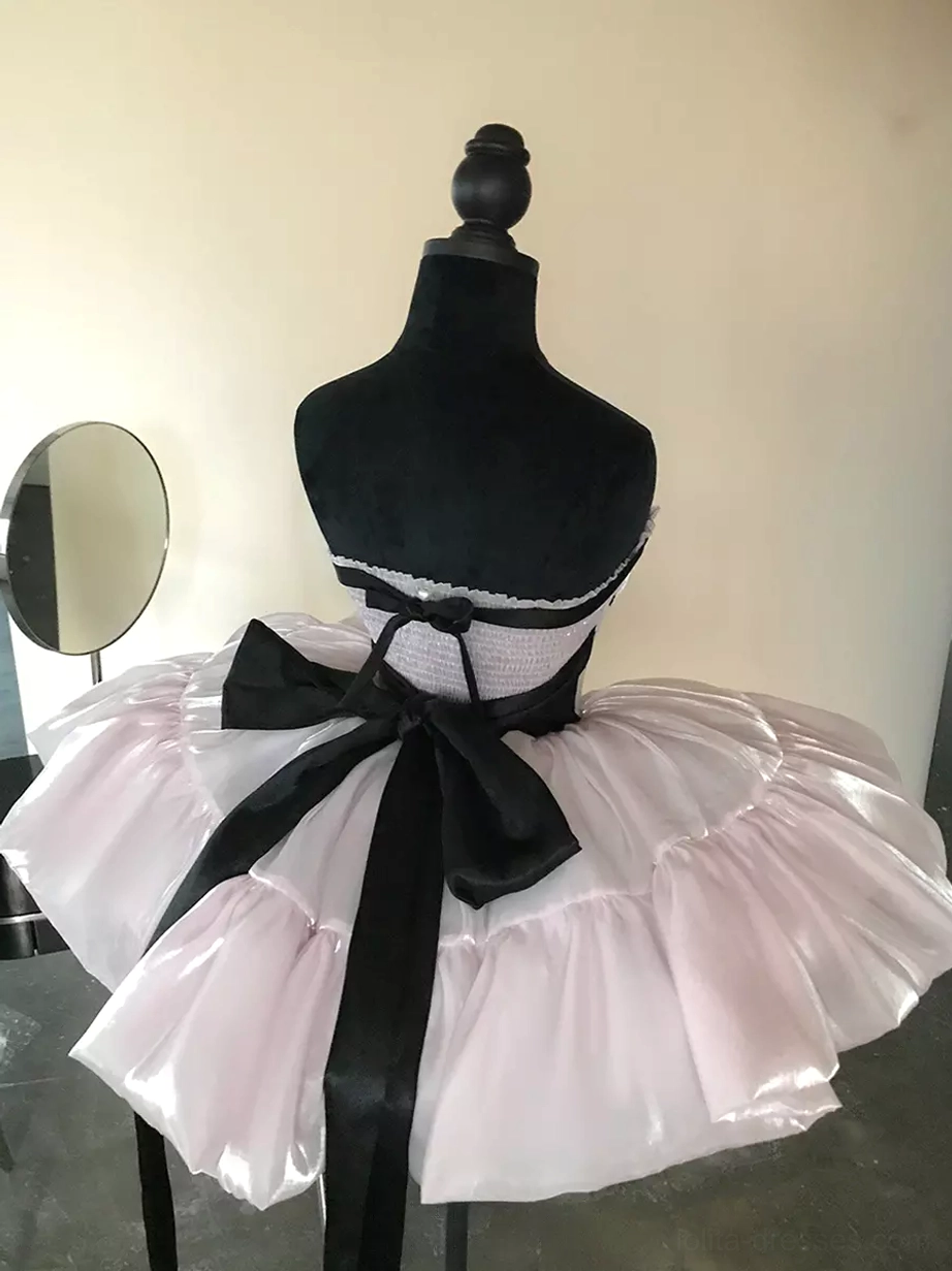 Pink polka dot lolita dress with statement elements bow and ruffles versatile sizing XS S M L for different body types