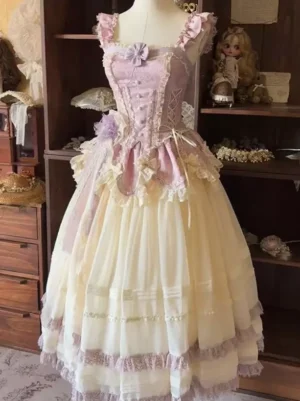 Pink-purple ruffled three-quarter front view of sweet lolita JSK dress with corset bodice, cream multi-layered tulle skirt, and lace detail trims on dress mannequin