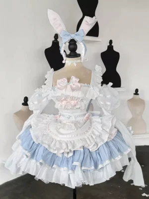 Pink rabbit maid lolita dress set with bow embellishments and frilled trims displayed on dress form, close-up front view showing detailed ruffled construction and sweet lolita style