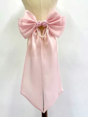 Pink Rococo Lolita detachable train bow tail accessory front view on mannequin with rose and pearl chain embellishments