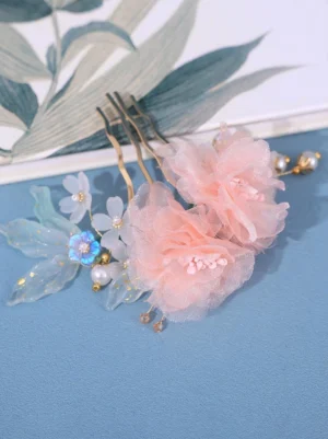 Romantic floral hair comb with soft pink sheer roses, resin flowers, and faux pearl accents featuring gold metal prongs - ideal Lolita accessory headwear for elegant styling