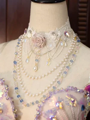 Romantic lace choker with pink fabric rose and blue-toned crystal layered chain necklace, fairy lolita style - front flat view dress collar