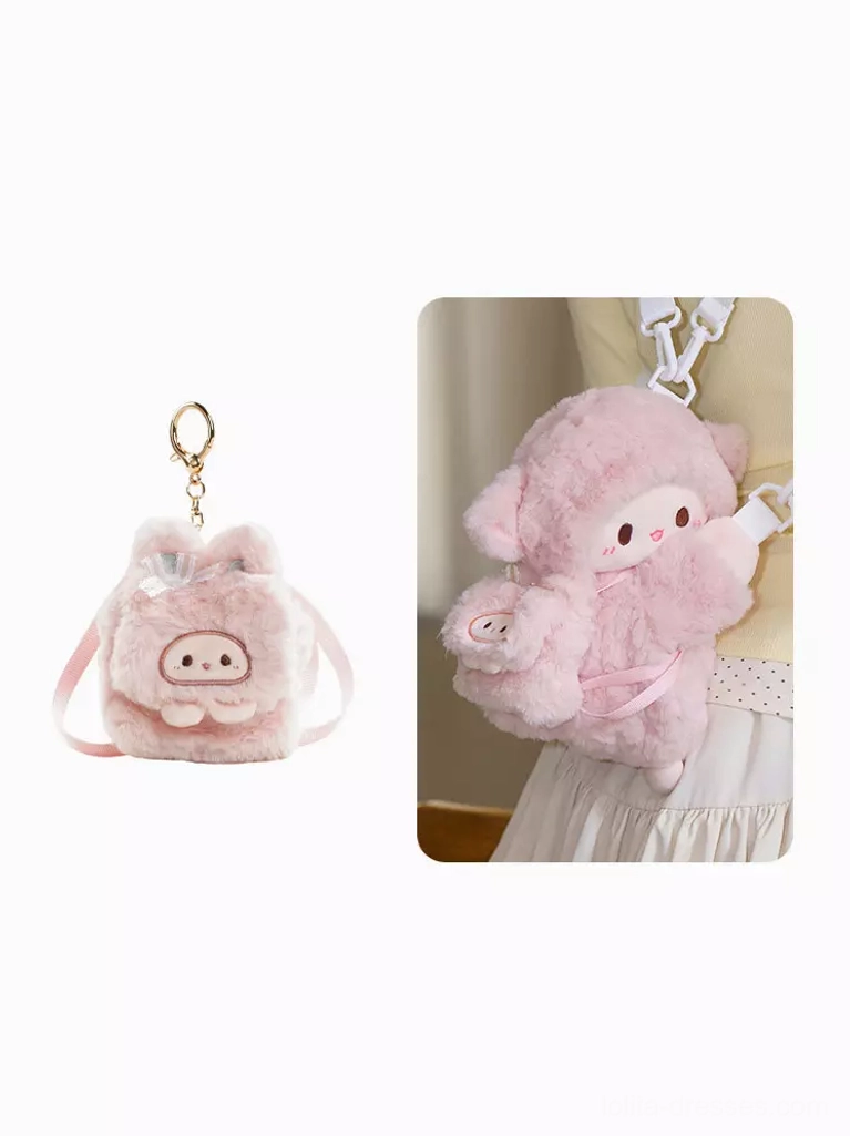 Cute pink sheep plush coin keychain pouch front flat lay design with cartoon sheep face and metal keyring