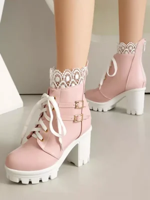 Pink Sweet Lolita ankle boots with chunky heel worn on feet showing dual angle view with white sole and lace collar details