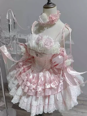 Pink sweet lolita formal gown side profile showing multi-layered ruffled skirt and satin ribbon details off-shoulder styling