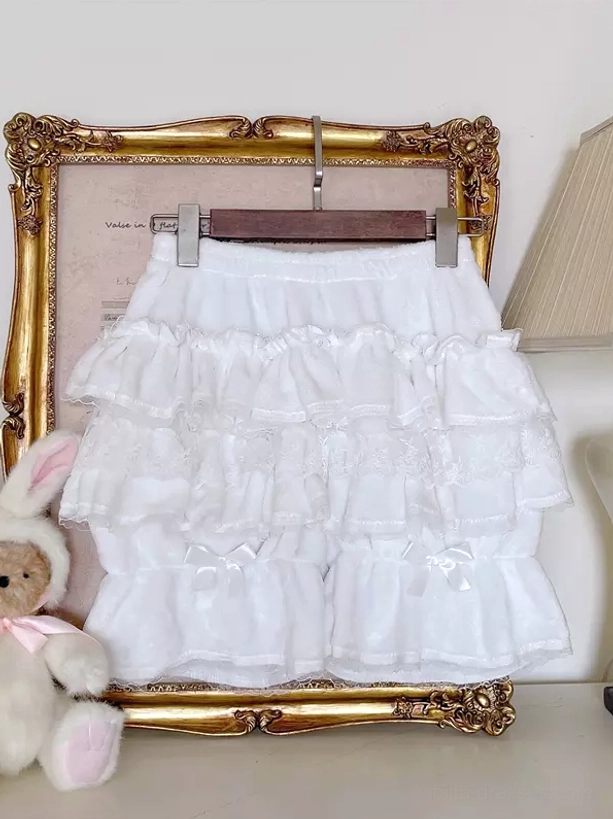 Pink Sweet Lolita bloomers flat display view with multi-layer lace ruffles, premium velvet fabric, and decorative hem bows in vintage setting