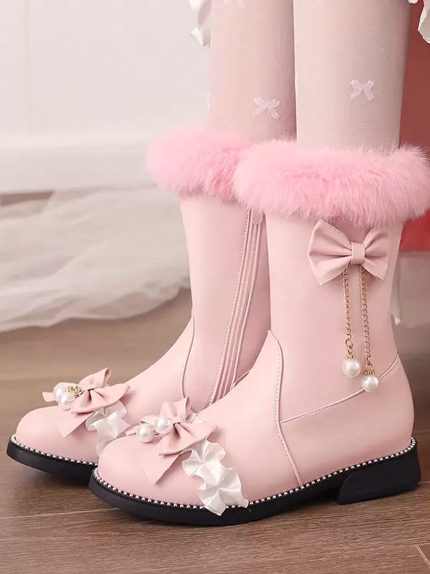 Pink sweet lolita mid-calf boots with pink faux fur cuff and pearl tassel bows, white ruffle trim details, modeled with bow-patterned nude tights dual front view