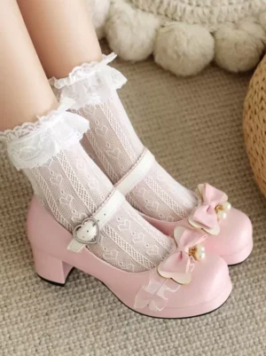 Pink sweet lolita chunky heel pumps with pearl bow and heart buckle ankle strap, worn with frilly lace socks, side low-angle view showing round toe design and romantic sweet lolita aesthetic