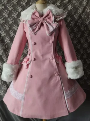 Pink sweet lolita winter coat with white fur collar and cuffs front view displayed on dress mannequin showing double-breasted buttons and ornamental bow