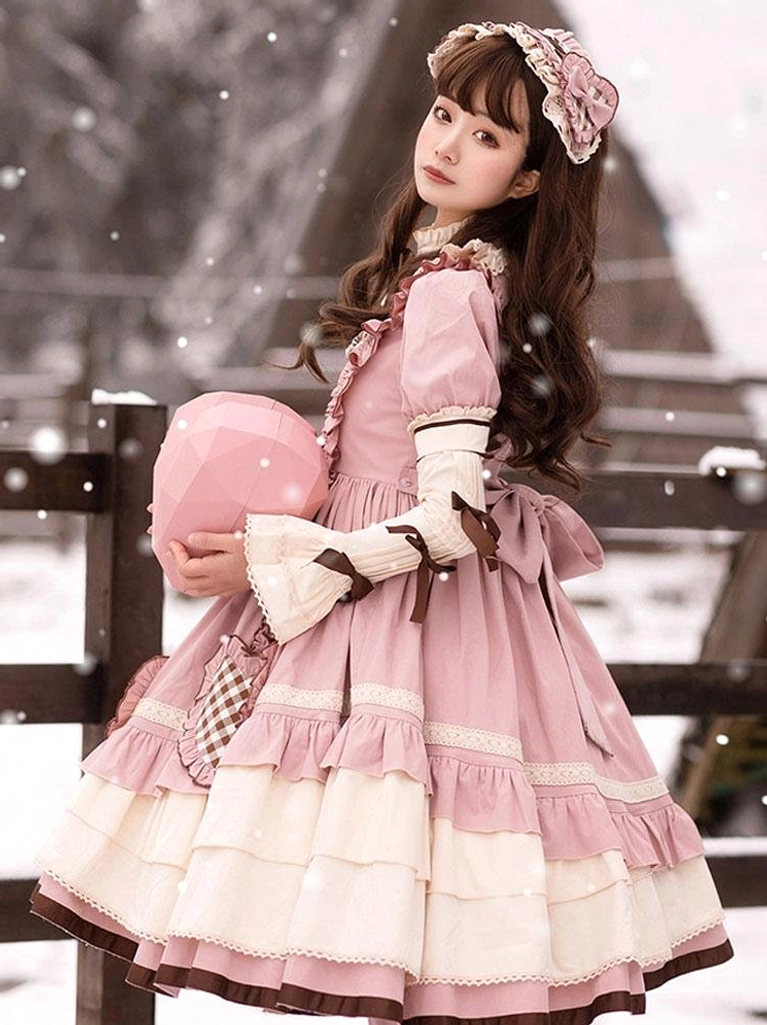 Pink sweet lolita dress with removable ruffled sleeves large back bow and heart gingham patch three-quarter side shot