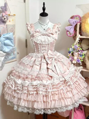 Pink sweet lolita sleeveless jumpskirt with lace appliques and oversized front bow detail