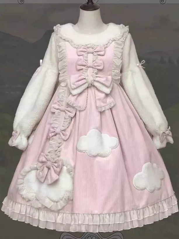 Pink lolita dress with plush sleeves multiple bows and cloud patches flat front mannequin display