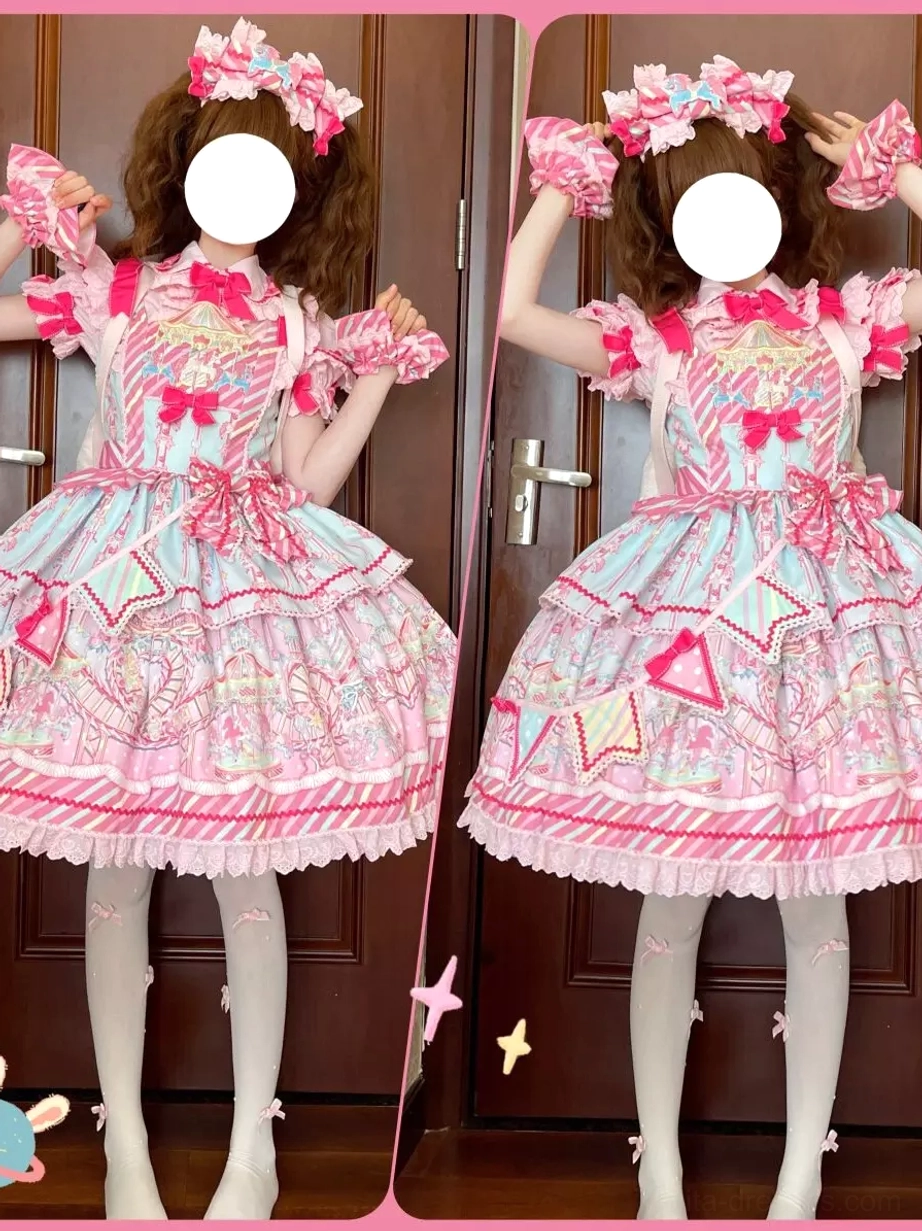 Indoor front shot of girl wearing pink sweet lolita dress with long ruffle sleeves and heart-shaped handbag at airport floor location