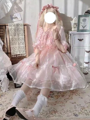 Pink sweet lolita fairy dress with ruffled half sleeves full-body front view showing tiered tulle skirt and bow details