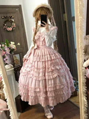 Pink sweet lolita jsk dress sleeveless tiered ruffles satin bows full length mirror selfie blonde twin braids straw hat white inner blouse