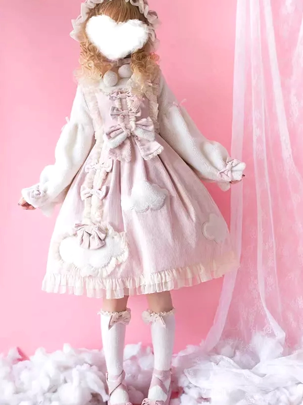 Pink sweet lolita long sleeve dress with cloud appliques and bows on model full body front view