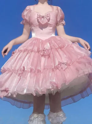 Pink Sweet Lolita One-Piece Dress with Puff Sleeves and Tiered Ruffles - Front View with Model in Outdoor Setting