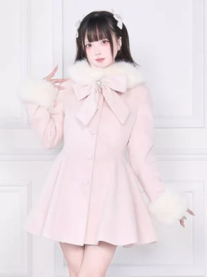 Front right three-quarter view of pink sweet lolita overcoat showcasing front button closure and white fur cuffs with flared skirt hem