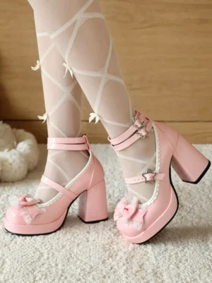 Pink sweet lolita platform pumps with double star buckle ankle straps and front bow, modeled with lace-up stockings, low frontal angle view showcasing glossy PU leather