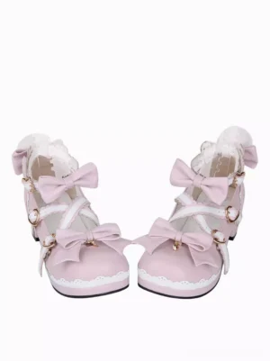 Pink lolita mary jane shoes side profile showing ankle lace collar bow decorations closed round toe block chunky heel crisscross strap detail sweet lolita style