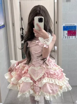 Pink sweet lolita dress back view lace-up corset bodice cascading ruffles heart cross decoration