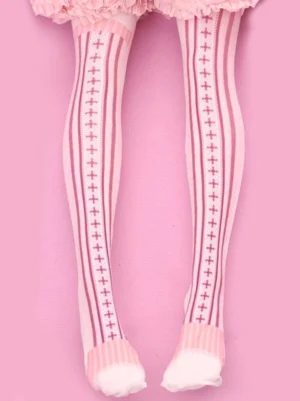 Pink velvet lolita thigh-high socks with dark pink cross and stripe print worn on model legs with pink frilly lolita dress hem, overhead front view showing full sock length and detailed print pattern