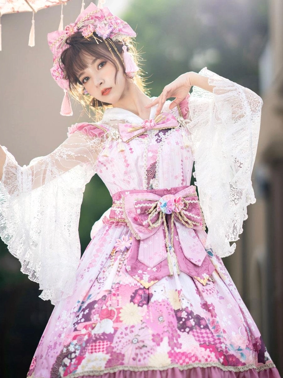 Pink and white lolita dress set with sheer lace flared sleeves large front waist bow and floral printed skirt in natural soft lighting