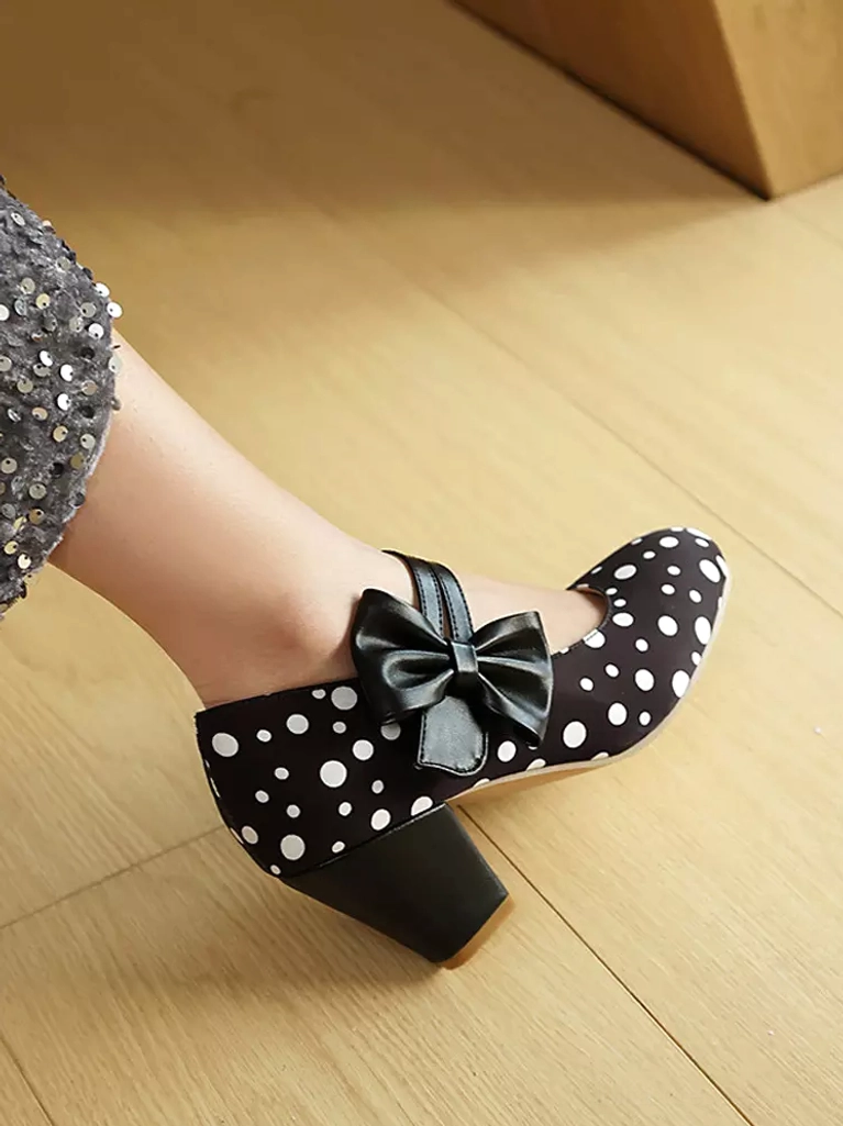 Polka dot Mary Jane lolita pumps in multiple colorways showing versatile vintage-inspired design with round toe and bow strap detail