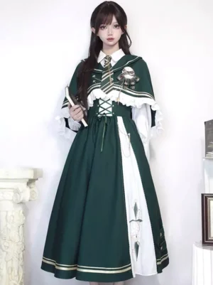 Classic lolita academic priestess outfit half-body front view showing decorative brooch striped necktie and lace-trimmed cape details