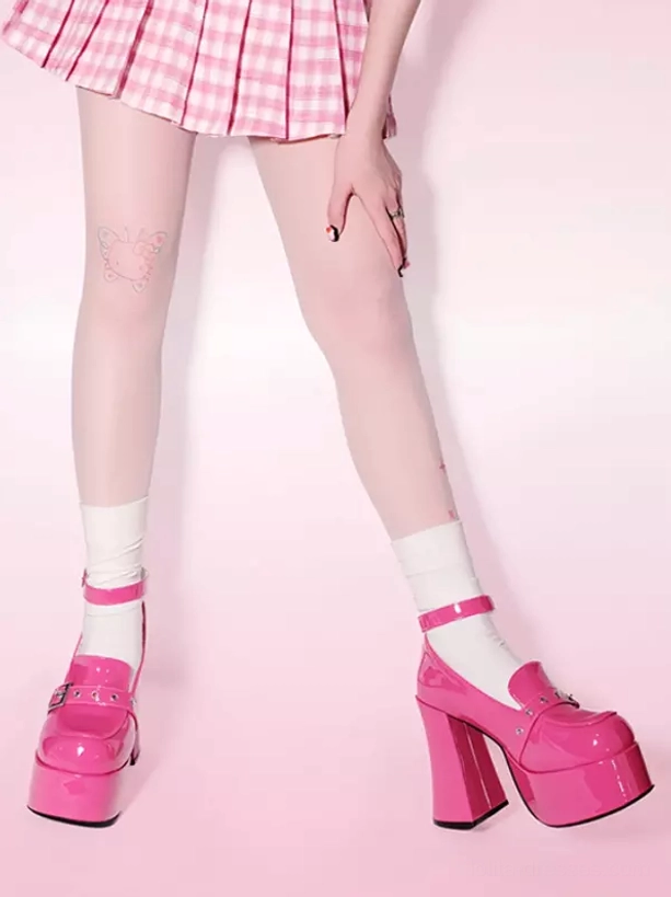 Patent leather punk lolita chunky platform boots showcasing detailed ankle buckle construction and glossy high-shine PU finish for alternative fashion