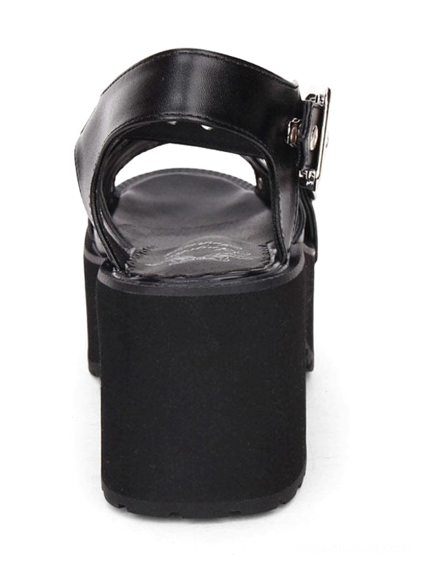 Single black punk Lolita sandal rear heel view showing solid block heel structure and ankle buckle strap detail