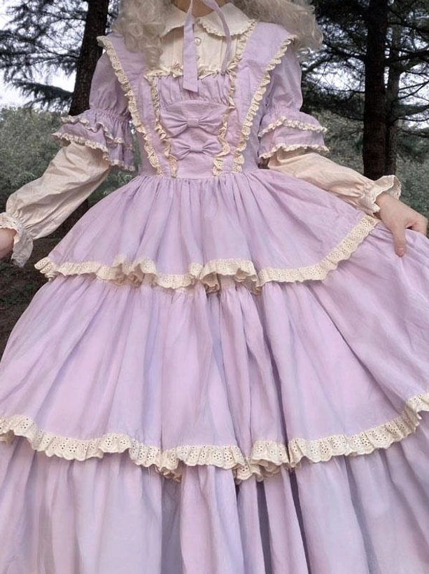 Purple fairy lolita dress front close-up detail shot showing front bust bowknot ruffled puff sleeves layered lace skirt hems
