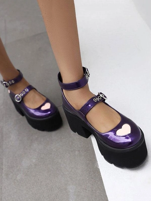 Pair of purple gothic lolita platform Mary Jane shoes front three-quarter view showing double buckle straps and chunky heel platform design