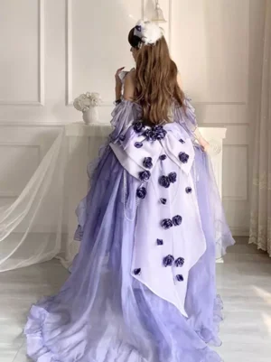 Back view of purple sweet lolita fairy dress featuring large statement bow and long flowing tulle train with rose decorations
