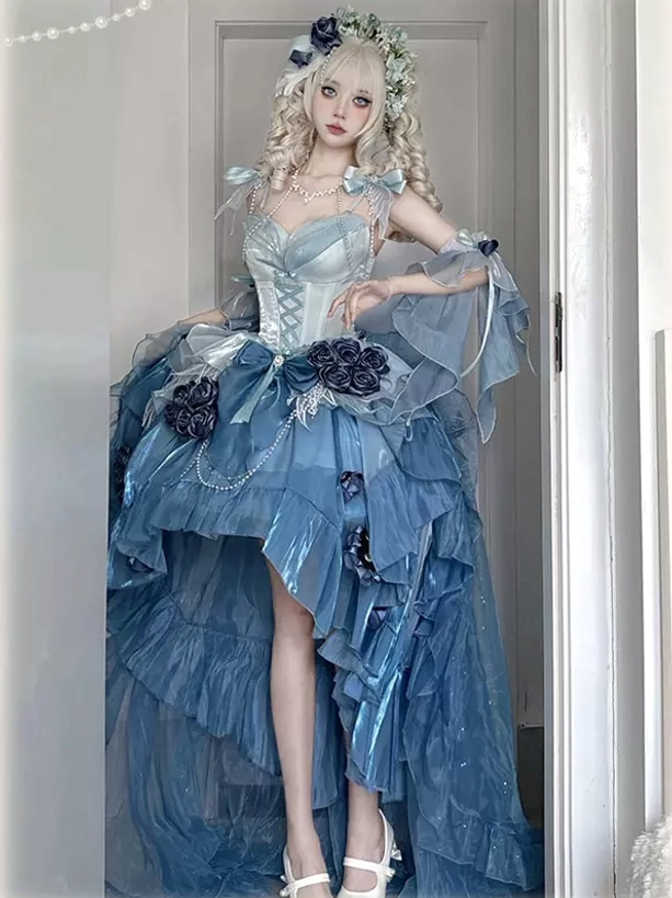 Purple sweet lolita fairy dress with full ruffled tulle skirt layers and statement back bow showing silhouette