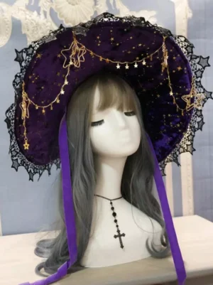 Purple gothic witch lolita headdress featuring star pattern velvet and gold star chain trim, front view with long purple chin straps