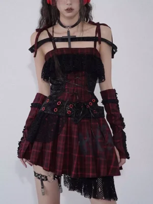 Red and black plaid gothic lolita JSK dress with lace-up corset bodice front three-quarter view on model wearing cross choker and red headphones