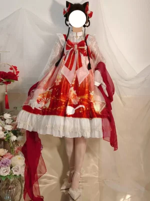 Red floral cat print sweet Lolita jumper dress full front view with oversized bow embellishment and ruffled lace hem worn indoors with decorative floral background