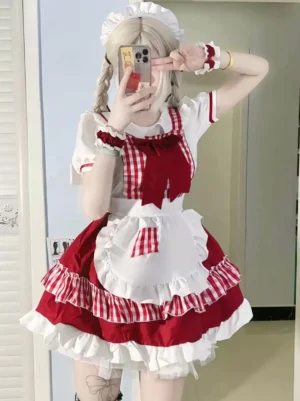 Side view of red-white gingham lolita maid dress showing layered ruffle details and decorative apron trim