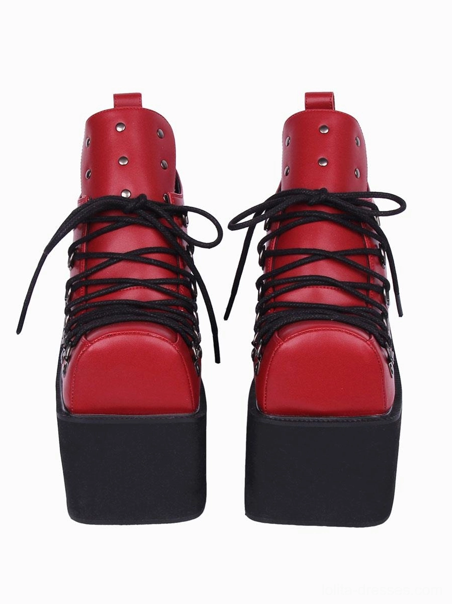 High-collar red gothic lolita platform pumps with ankle collar featuring silver grommets, black laces and wedge sole, front direct paired view