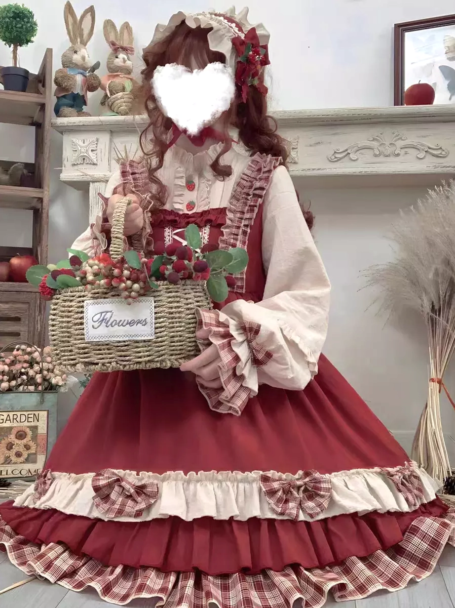 Close-up front view of red Lolita dress with inner blouse and large flower basket showing full ruffled skirt volume