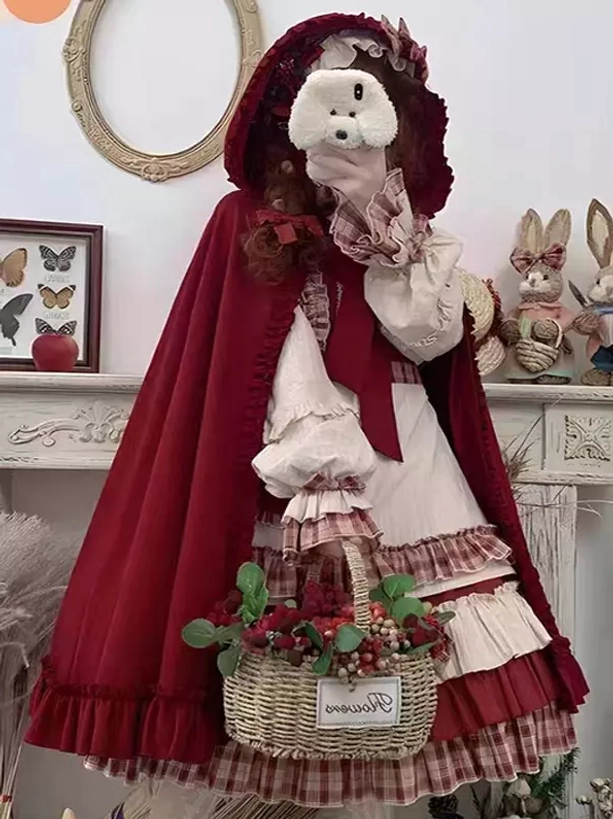 Red Lolita dress with coordinating cape and headwear showing complete multi-piece set components for total look coordination