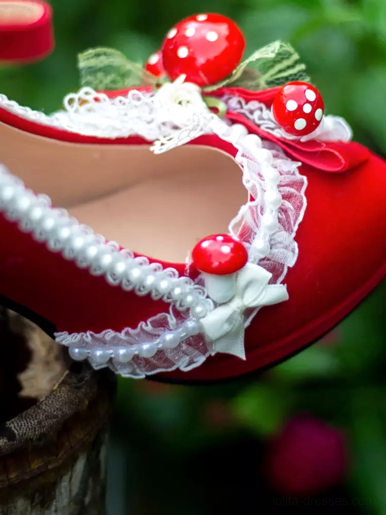 single red lolita heel shoe side top close-up view wooden stump pearl lace trim red mushroom ornaments white bow accents
