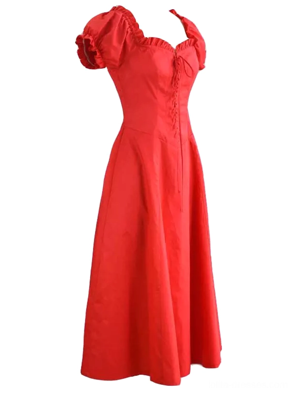 Red vintage-inspired Lolita dress featuring puff sleeves, solid red cotton fabric and fuller A-line skirt creating elegant silhouette