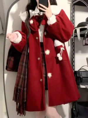 Red sweet lolita long overcoat with lantern sleeves and fuzzy trim details, front half-side angle showing single-breasted buttons and decorative pom-pom accents