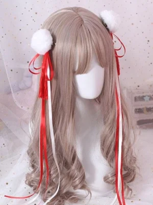 Red pom-pom tassel Lolita hair pin with pearl embellishments and off-white ribbons, displayed on mannequin with curly wig against starry pink backdrop, showcasing 3/4 front angle of this elegant Japanese Lolita headwear accessory