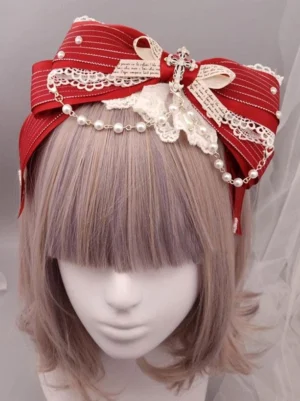 Red striped classic lolita bow headdress with delicate pearl chain white lace ruffles and vintage paper tags metallic cross detail mannequin front perspective