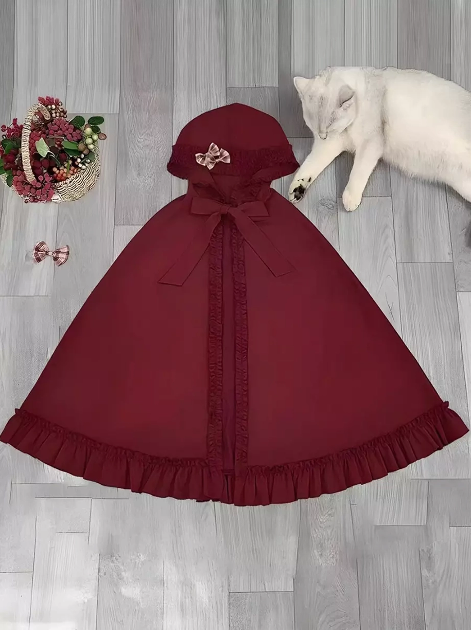 Red sweet Lolita dress closeup showing plaid pattern and ruffled tier construction of skirt hem detail